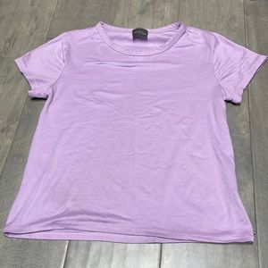 Light purple shirt, size medium for juniors.